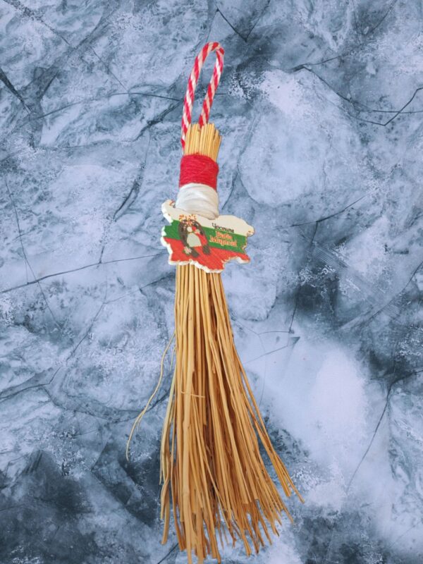 kleine bezem met beeldje